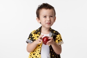 young boy with apple commercial air fryer